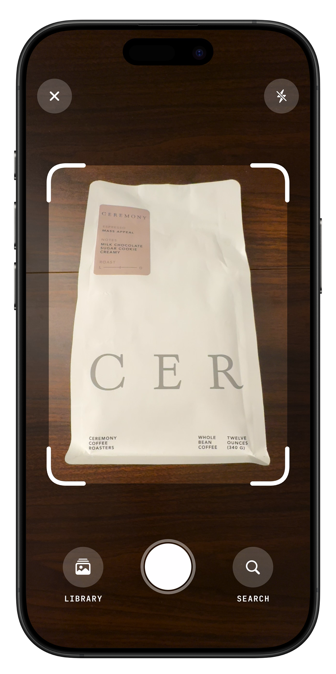 Tazzina camera screen scanning a coffee bag to identify the bean
